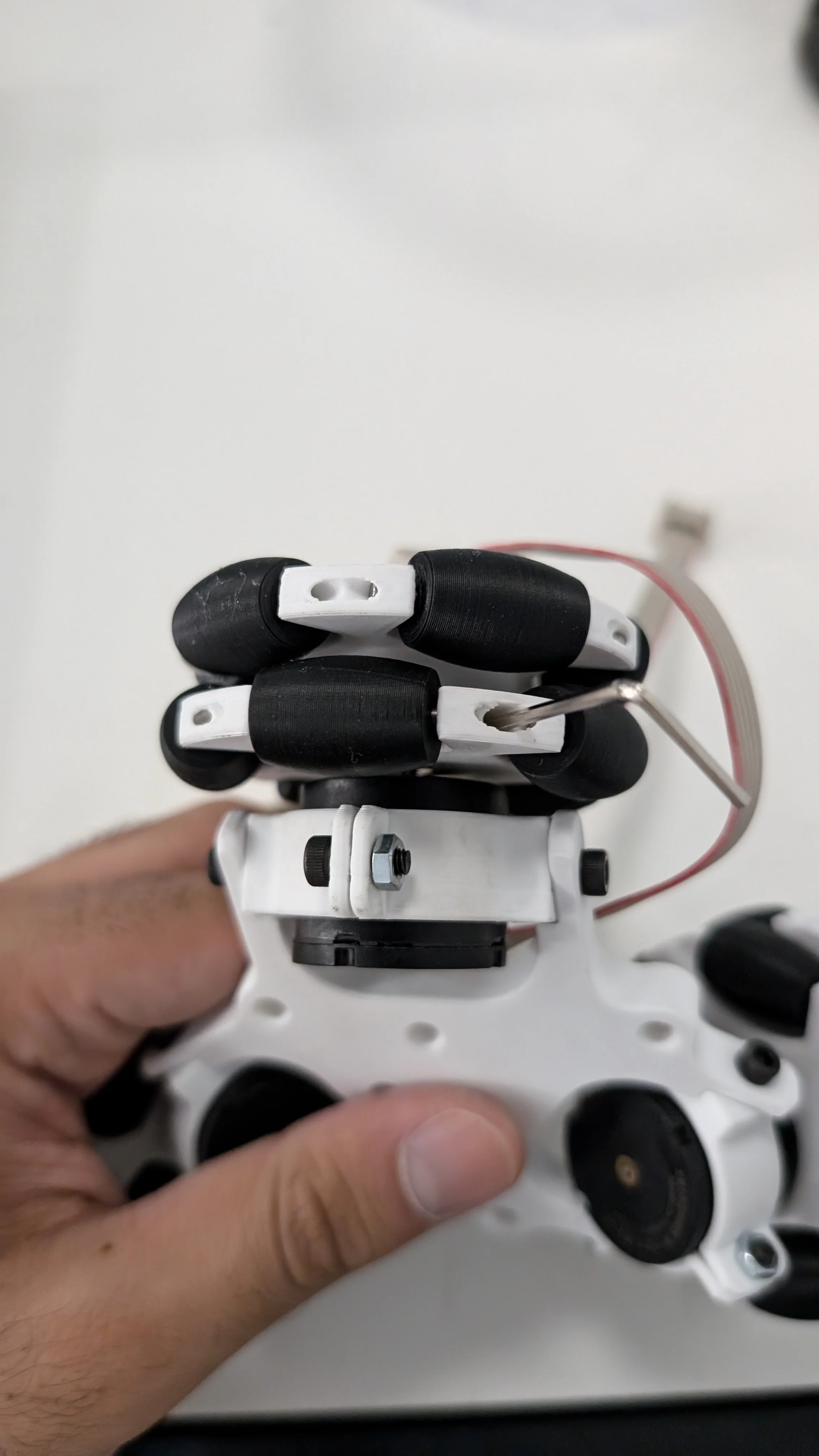 Assembled V3 omniwheel with TPE-83A rollers and shaft collar installed on motor shaft